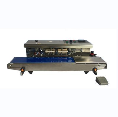 China Food Fill Nitrogen Gas Potato Chips Aluminum Plastic Bag Heat Automatic Continuous Horizontal Embossing Rinsing Machine for sale