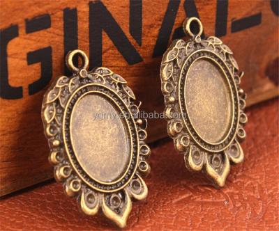 China Classic Zinc Alloy Pendant Settings For 25*18mm Oval Flat Back Cabochons, 5styles Empty Pendant Diy Jewelry for sale