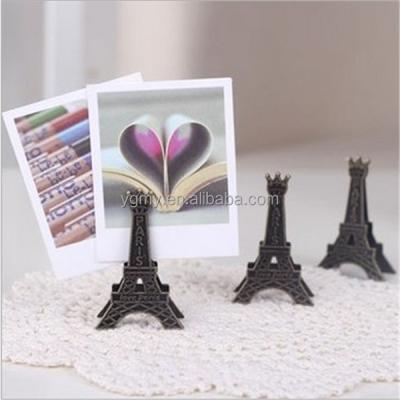 China Vintage Metal Eiffel Tower Wedding Gift Stands Creative Metal Clip Name Card Note Photo Clip Holder for sale