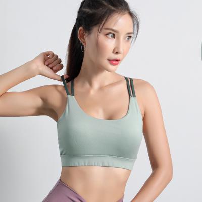 China Custom Rated Women's Workout Crop Top Halter Compression Logo Logo Front Tip Breathable Fitness Sports Bra for sale