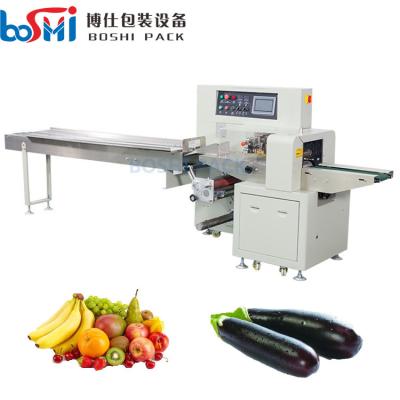 China Automatic fruit vegetable carrot pouch flow horizontal packing packaging machine en venta