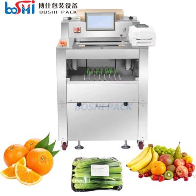 中国 Package machine for fruit packaging foods machine stretch film strawberry meal cling wrap packing machine 販売のため