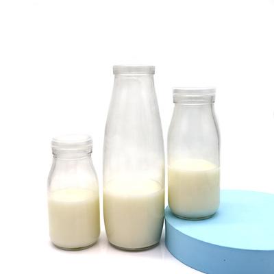 China 200ml 250ml 500ml Recyclable Glass Milk Bottle Food Bottle Empty Glass Yogurt Bottle With Lid for sale