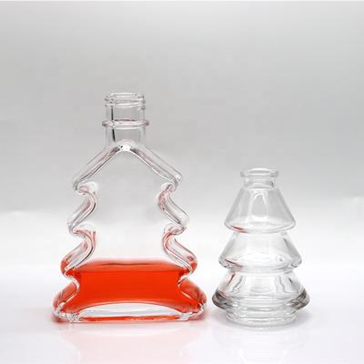 China Recyclable Reed Diffuser Bottle Creative Glass Aromatherapy Bottle Christmas Tree Shaped Bottles for sale