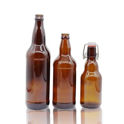 China Eco-friendly Recyclable Amber Glass Wine Bottles Beer Hot Sale Bottle For Sparkling Alcohol Juice Beverage With Metal Crown Cap for sale