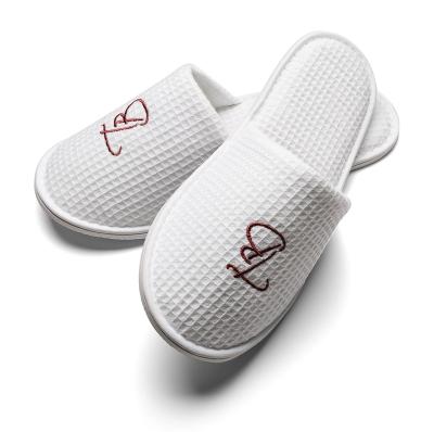 China Fashion Trend Slippers Home Aviation Devoted Soft Disposable Hotel Slippers Waffle Fashion Indoor Slippers for sale