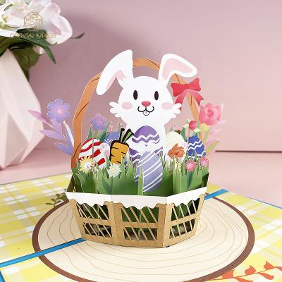 China 2022 Universal 3D Paper Cut Easter Bunny And Egg Basket Personalized Pop Up Card for sale