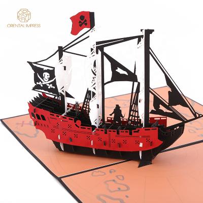 China Universal 2022 Handmade 3D Pirate Ship Craft A5 Cool Black Pop Up Paper Greeting Cards for sale