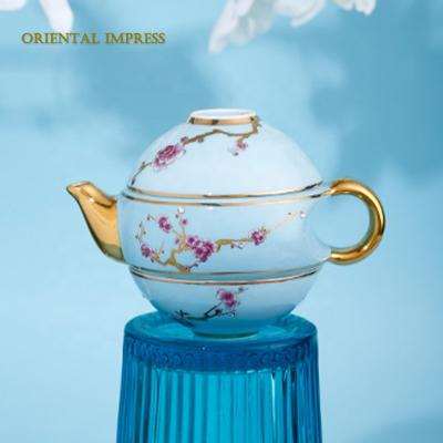 China 2021 Viable The Best Selling Chinese Style Plum Blossom Pattern Spherical Portable Bone China Travel Tea Set for sale