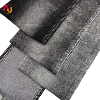 China Breathable 380g stretching black indigo color twill knitted High stretch cotton heavy raw Denim jeans fabrics for sale