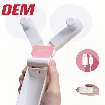 China Draagbare mini-koelventilator OEM zomer draagbare ventilator handgemaakt schattig lithiumbatterie vouw plastic zomer cartoon Te koop