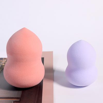 China Base small quantity accept water dry and wet drop sponge 2pcs makeup squash powder puff combination beauty tool oblique cut egg for sale