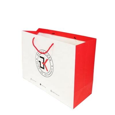 China Luxury Wholesale Red Sides And Rope Shopping Bag Handles White Paper Bags For Call Shop for sale