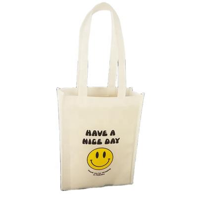 China Custom Logo Zero Waste Medium White Handled Wholesale Nonwoven Shopping Bags for sale