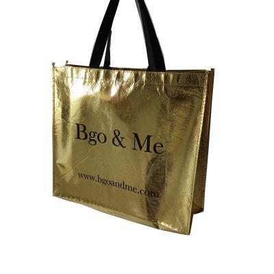 China High quality and reusable metallic non woven fabric handled for custom bags gold laser shopping bags for sale