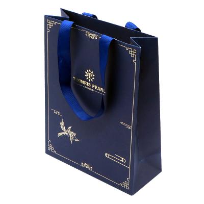 China Handmade Logo Printing Jewelry Packaging Kraft Paper Bag for sale