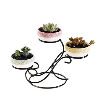 China Europe Color Reactive Indoor Mini Planter With Iron Metal Round Stand Ceramic Plant Pot For Succulents. for sale