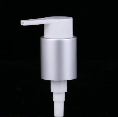 China Cosmetic 22 / 410 Staples Left To Right Lock Lock Cosmetic Plating / Anodized Aluminum Lotion Pump for sale