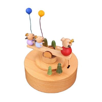 China Hand Crank Operated Wooden Musical Box Beautiful Piglet Rocking Music Box For Present for sale