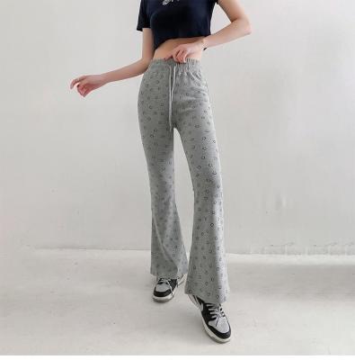 China Breathable Comfortable Slim Personality Women Black Smiling Stretch Print Flared Retro Long Pants Patterned for sale