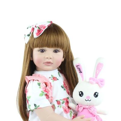 China Cartoon Toy 23inch Yellow Hair Bebe Doll For Kid Gift Flower Skirt Vinyl Reborn Doll for sale