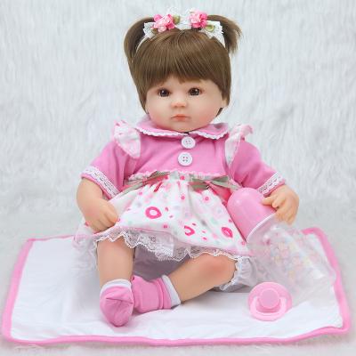 China 42cm Cheap little girl pink lifelike reborn doll in silicone small size soft vinyl reborn doll bebe reborn with cloth body for sale