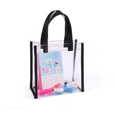 China Lovely Recyclable Wholesale Customized Portable Reusable Clear PVC Grocery Shopping Tote Bag With PP Webbing Handle for sale