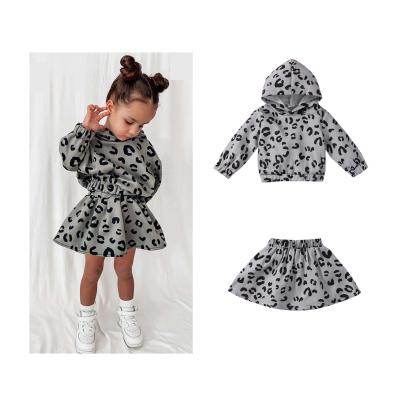 China Autumn Boutique Sale Conyson Girls Casual Clothing Set Hoodie Leopard Top Wholesale Casual Skirt Hot Teams for sale