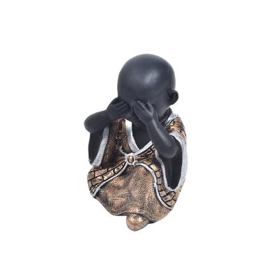 China Indian Monk Sitting Buddha Europe Custom Resin Baby Statue Small For Home Decor Baby Monk Buddha Statue for sale