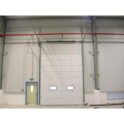 China Guangzhou QX Industrial Automatic PU Security Automatic Steel Sectional Door for sale