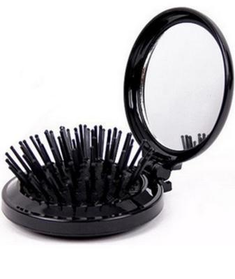 China Professional Waterproof Portable Health Massage Brush Hair Magic Comb Around Plastic Mini Folding Hair Brush With Mirror for sale