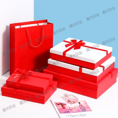 China Recyclable Custom Made Environmental Friendly Red Ribbon Bow Packaging Gift Cosmetic Packaging Paper Box for sale