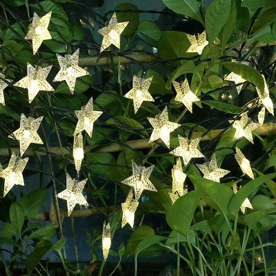 China 2 Warm White Waterproof Holiday String 60 LED Solar Christmas Light Outdoor Light Star Patterns for sale