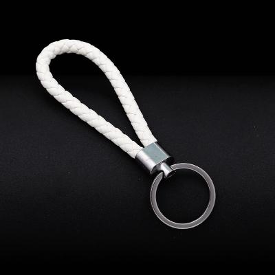 China Hot Woven Advertising PU Leather Rope Hand - Woven Male And Female Car Key Chain Color Leather Rope Bracket for sale