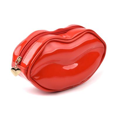 China Lip Shaped Custom Special Women Lip Cosmetic Bag Pouch Enamel PVC Red Lip Shaped Makeup Bag for sale