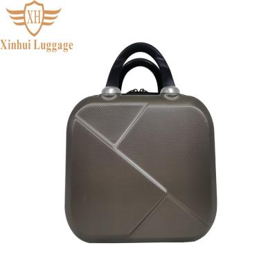 China Custom Fashion Logo Luxury Travel Abs Makeup Bag Mini Cosmetic Case With Soft Handle for sale