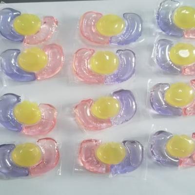 China 2024 OEM Fragrance Best Selling Liquid Laundry Capsule Detergent Capsules Pods 3 In 1 Laundry Beads for sale