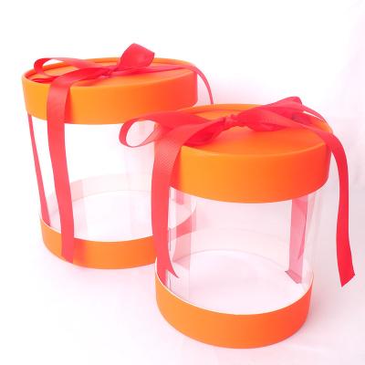 China Factory Recyclable Ready To Go Transparent Orange Color Round Cylinder Paper Box Tube Box With Clear PVC Window LED Light And Sliver Handle for sale