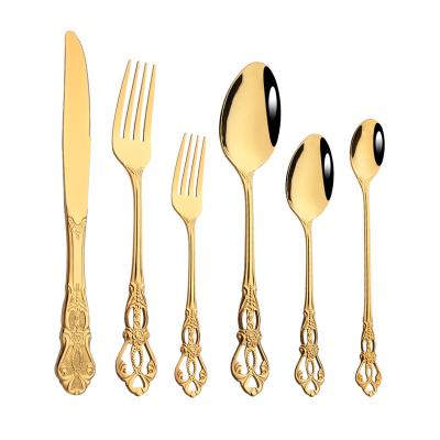 China Viable Dozen 12 Pcs Gold Embossing Stamp Seafood Fork Cheese Knife Broth Spoon Cutlery Set Iced Teaspoon for sale