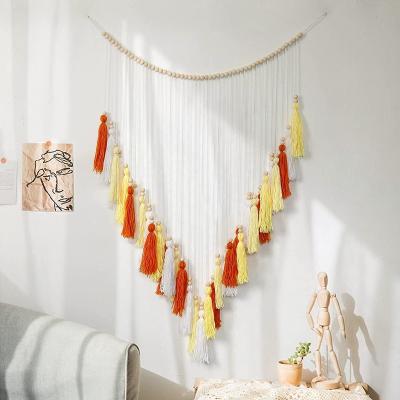 China Eco-Friendly Macrame Wall Hanging Wood Beads Tassel Garland Large Macrame Yarn Tassel Wall Hanging Boho Decor Wall Art for sale