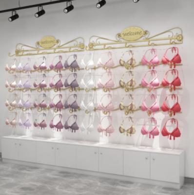 China Eco-friendly Material Gold Panties Show Rack Wall Bra Shelf Hook Store Display Rack Floor Display Cabinet for sale