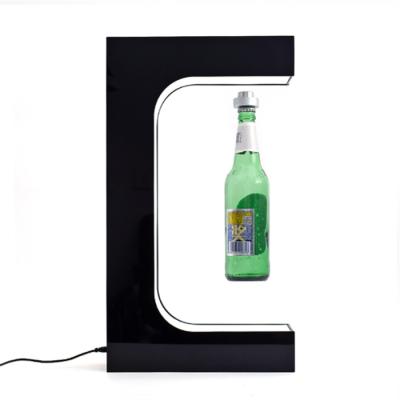 China Decoration; Wholesale Display Levitating 360 Degree Led Acrylic Magnetic Levitation Shoes Rotating Wine Bottle Display Stand for sale