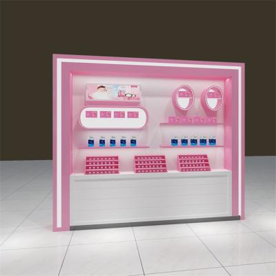 China Customized Design Showcase Makeup Rack Display With Mirror for sale