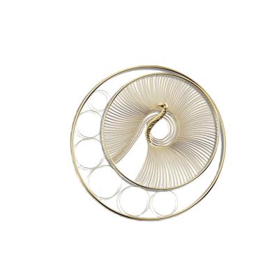 China Factory Price European Modern Luxury Abstract Metal Art Round Minimalist Wall Decor With Gold Snake for sale