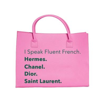 China Wholesale Custom Vegan Durable Leather Me Speak French Fluid Tote Bag Handbag For Women Purses for sale