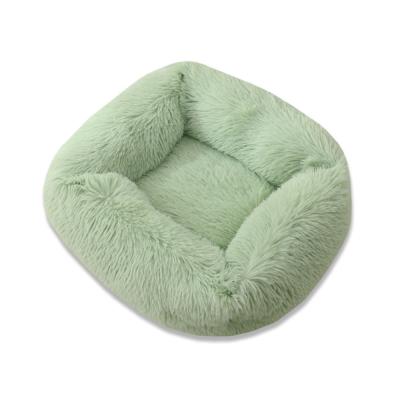 China Comfortable Washable Soft Faux Fur Donut Dog Cat Bed for sale