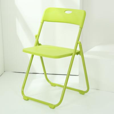 China Foldable manufactures chair plasticas new green folding chair plastic folding chair with metal leg for events party for sale