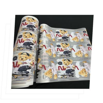 China Apparel/Cotton/Leather/Cloth/Textile/Shoes/Caps T-shirt Printing Single Side Heat Transfer Film DTF PET Hot Peeling Film Roll For Sock Caps DTF Printing Printing textile fabric clothing for sale