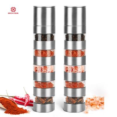 China Viable Multifunctional 4 in 1 Spice Adjustable Grinder Bottle Coarse Salt and Pepper Multilayer Manual Grinder Seasoning Grinder for sale