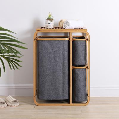 China Amazon Hotel Laundry Hamper High Quality Sustainable Home Bamboo Frame Clothing Storage Basket for sale